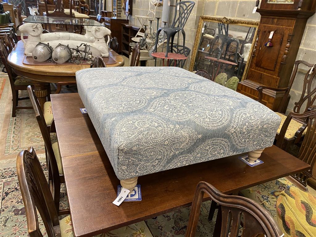 A Victorian style rectangular footstool upholstered in Colfax and Fowler Paisley type fabric, width 97cm, depth 78cm, height 30cm